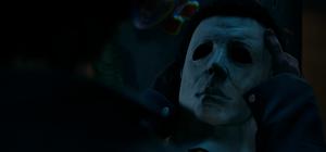 Official Steam screenshot from Halloween: The Game showing Michael Myers in a dark Haddonfield scene.