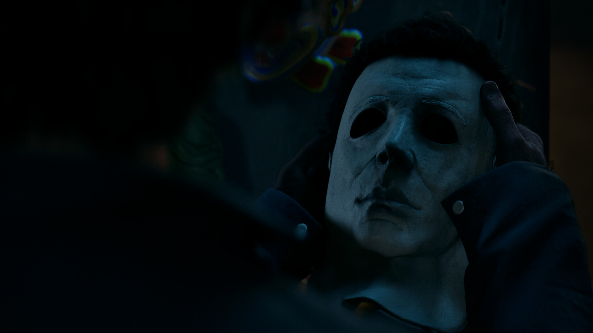 Official Steam screenshot from Halloween: The Game showing Michael Myers in a dark Haddonfield scene.